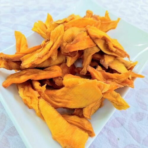 Organic Dried Mango “Amelie” from Ivory Coast on a white dish